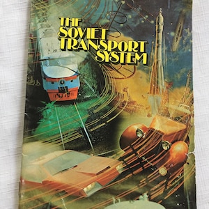 May include: A vintage book cover with a colorful illustration of a train, car, and rocket ship. The title of the book is "The Soviet Transport System".