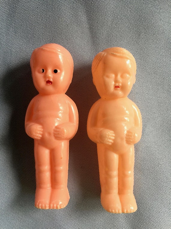 small toy baby dolls