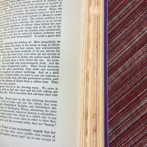 May include: A close-up of a page from a book titled "Point Counter Point" by Aldous Huxley. The text discusses the beauty and charm of a kitchen and the people who inhabit it. The page number is 247.