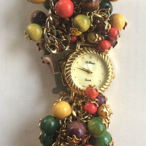 Wielokolorowy zegarek, koralikowy zegarek, kolorowy zegarek, zegarek na bransolecie, zegarek typu statement, nietypowy zegarek, zegarek charm, zegarek boho, zegarek, zegarek z lat 70.