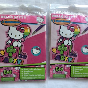 May include: Two packages of Hello Kitty party supplies. Each package includes 8 postcard invitations, 8 envelopes, 8 seals, and 8 save the date stickers. The packages are pink and feature a cartoon image of Hello Kitty holding a balloon.