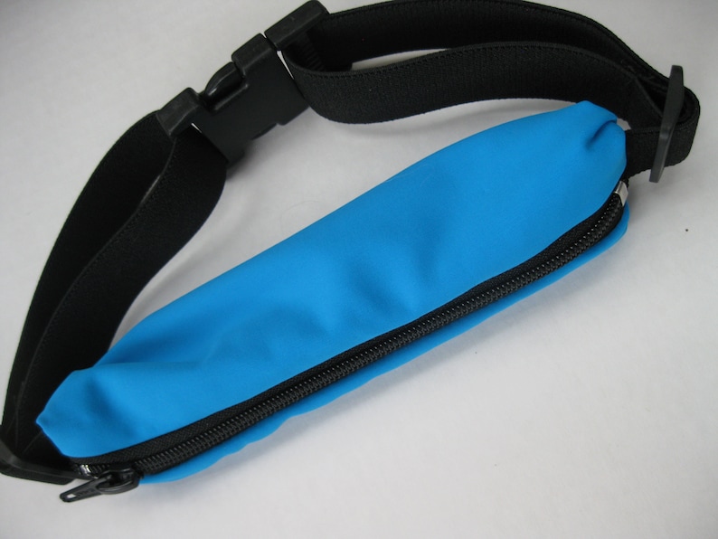 Elastic pocketed belts to carry epi-pen type medications. image 1