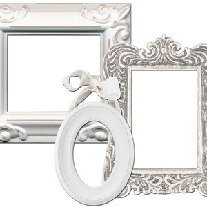 May include: Three white picture frames with ornate details. The frames are all different shapes and sizes. The largest frame is a square with a silver finish. The other two frames are a rectangle and an oval. The frames are all empty.