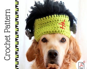 May include: A golden retriever dog wearing a green and black crocheted Frankenstein costume hat. The hat has a red stitched scar on the front.