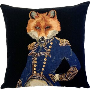 May include: A black velvet pillow with a tapestry design of a fox wearing a blue military uniform with gold buttons and trim.