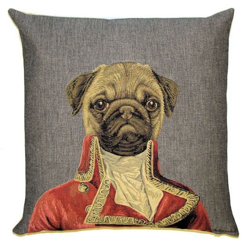 May include: A square throw pillow featuring a woven tapestry design of a pug dog dressed in a red military-style jacket with gold trim and a white cravat. The background of the pillow is a textured dark gray fabric, creating a portrait-style image.