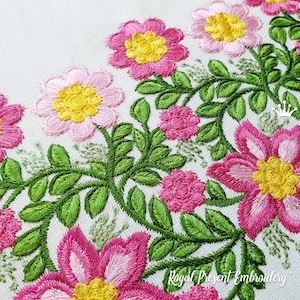 Elegantes Maschinenstickmuster mit floralem Rand