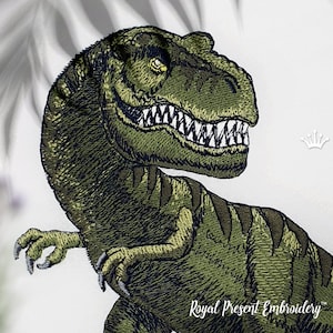 May include: Embroidered green dinosaur with sharp teeth and claws. The dinosaur is facing right and has a textured, detailed design. The text "Royal Present Embroidery" is visible at the bottom of the image.