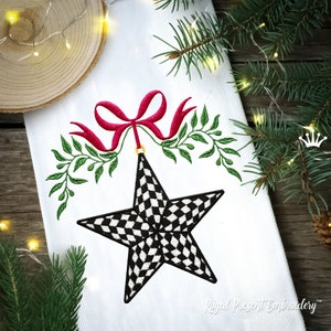 May include: A black and white checkered star with a red bow and green leaves hanging from it. The star is on a white background.