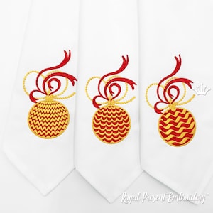 May include: Three white fabric napkins with red and gold embroidered Christmas ornaments. Each ornament has a different pattern.