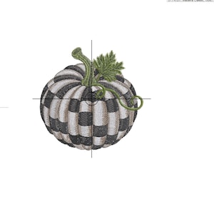 May include: An embroidery design of a pumpkin featuring alternating black and white striped segments. The pumpkin has a green stem and a green leaf attached to the top. The design includes technical specifications like 9.87x9.82 cm and 32600 stitches.