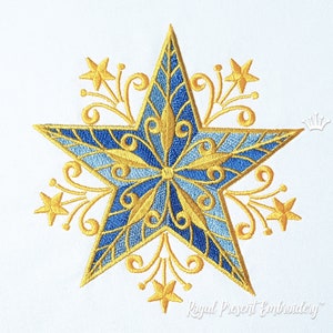 Può includere: Una stella dorata e blu con disegni intricati e volute. La stella è circondata da stelle più piccole e volute.