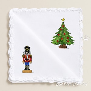 May include: White embroidered handkerchief featuring a red and blue toy soldier and a green Christmas tree with red baubles.
