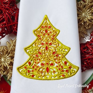 May include: An embroidered Christmas tree design in gold and red on a white fabric background. The design features intricate details and a delicate, lacy look.