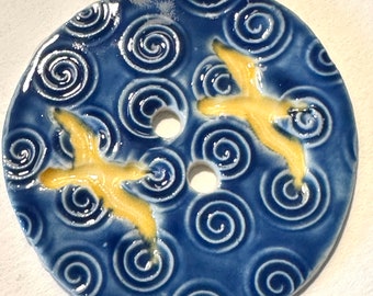 Jumbo 2.40-inch button handmade porcelain ceramic extra large artisan piece yellow birds seagulls swirled blue sky collectible beach coastal