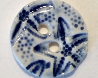 Beach stars. 1-inch fine English porcelain ceramic pottery sewing buttons deep navy cobalt blue starfish on white nautical coastal fashion