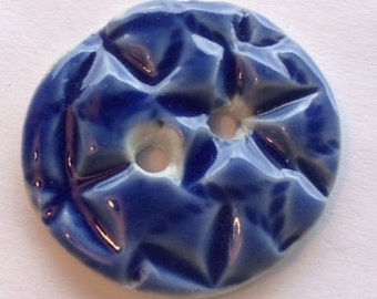 Oh my stars! Large 1.5-inch star pattern porcelain button. Bright, glossy, liquid-look, vibrant cobalt blue one-of-a-kind ceramic button