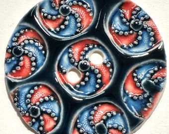 Jumbo pinwheels 2.46-inch handmade porcelain ceramic extra large artisan sewing button red sky blue navy swirls July Fourth dated 2024