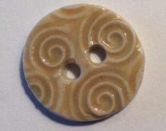 Pretty 7/8-inch porcelain ceramic pottery handmade buttons, glossy golden honey yellow, swirl motif, circular