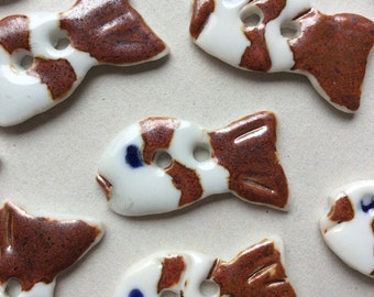 Whimsical, rust red & white fish-shaped, handmade porcelain ceramic buttons