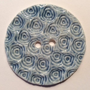 Jumbo 2.38-inch handmade porcelain ceramic pottery sewing knitting crochet button, deeply textured light blue powder blue signed dated 2022