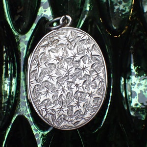 Antique Victorian Sterling Silver Engraved Ivy Leaf Locket, hallmarked 1880