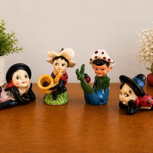 Vintage-Set japanischer anthropomorpher Marienkäferfiguren (4er-Set) – Verspielte Keramik-Feen-Dekoration