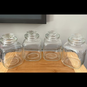 4 vintage glazen apothekerspotten met deksel van Hazel Atlas Company