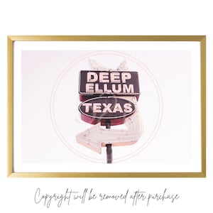 May include: A vintage neon sign with a pink and white color scheme. The sign reads "Deep Ellum Texas" and features a white arrow pointing to the left.