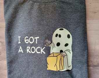 I got a rock Charlie Brown Peanuts inspired Halloween T-shirt