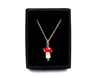 Glass mushroom pendant on sterling silver chain. Mushroom necklace. Red Glass Mushroom Necklace. Toadstool Necklace.