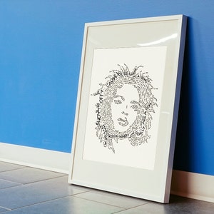 May include: A black and white word art print of a person's face. The words used in the art are lyrics from the song "Are You Gonna Be My Girl" by Jet. The words are arranged to form the outline of the person's face and hair.