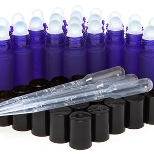 May include: A set of 25 cobalt blue glass roller bottles with black caps and white roller balls. The bottles are arranged in a pyramid shape with three clear plastic droppers in front of them.