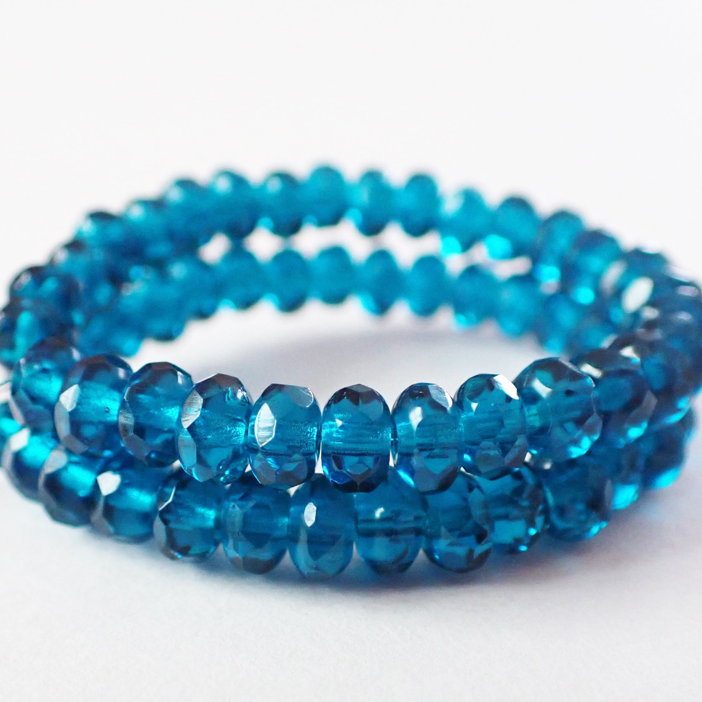 thumbnail image 2 of 25 Czech Glass Rondelle Beads – 8x6mm, Capri Blue Purple Bronze Mix 2 of 6