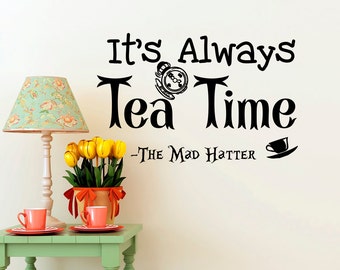 May include: Black and white wall decal with the text "It's Always Tea Time - The Mad Hatter" and a clock and teacup graphic.