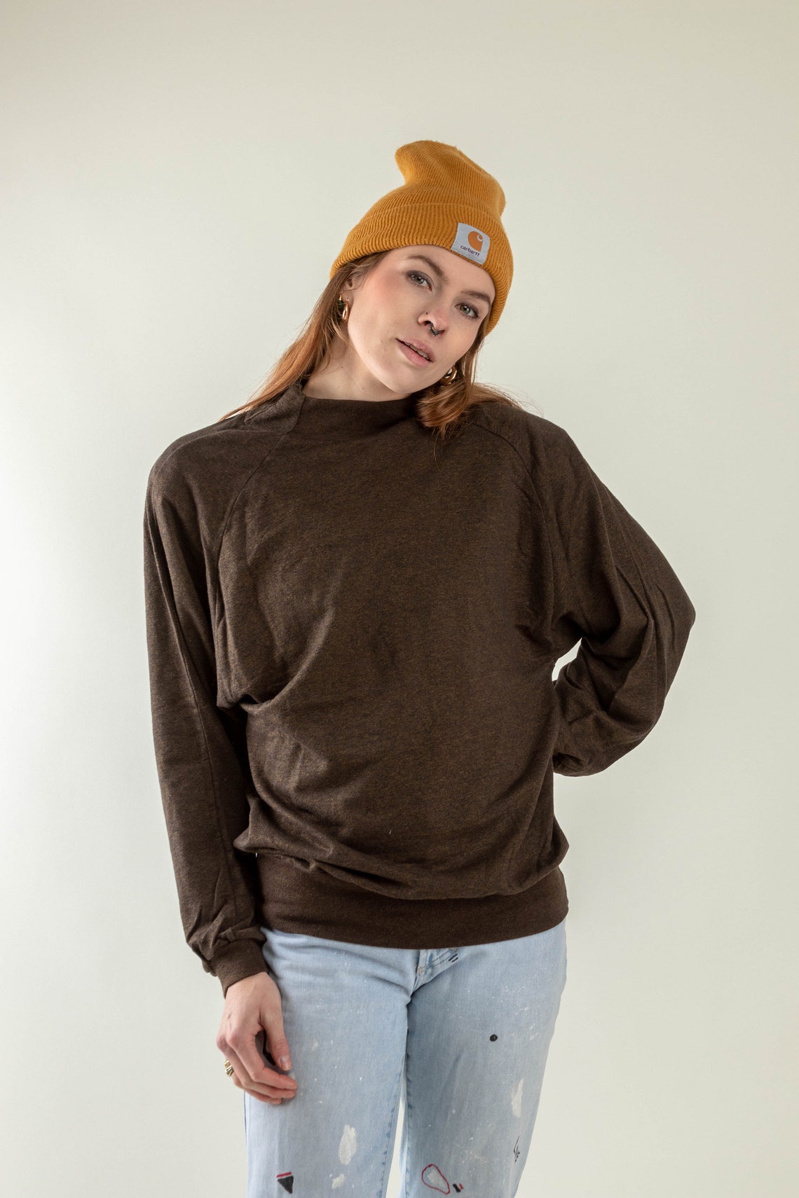 80s sweater tied around neck