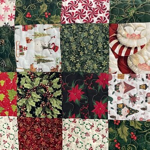 May include: A patchwork quilt with a festive Christmas theme. The quilt features various squares with holiday patterns, including snowflakes, holly, candy canes, snowmen, and Santa Claus. The colors are predominantly red, green, and white.