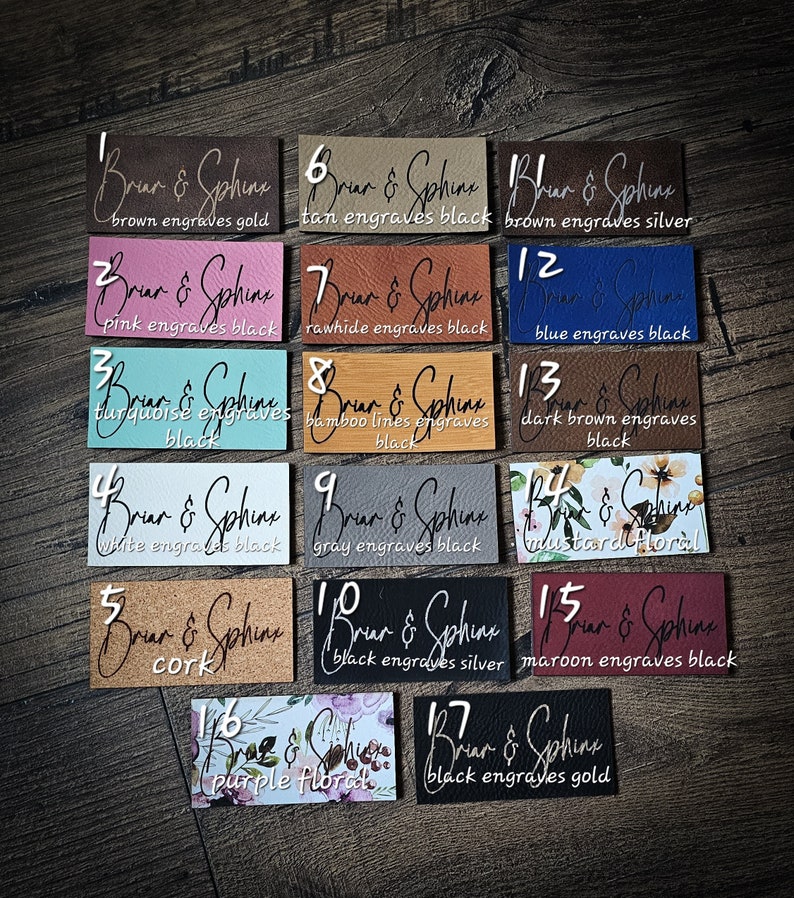 May include: A set of 17 leather patches with different colors and patterns. Each patch has the text "Briar & Sphinx" and a description of the color and engraving style. The patches are numbered 1 through 17.