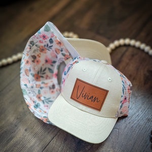 Cream floral mesh name hat