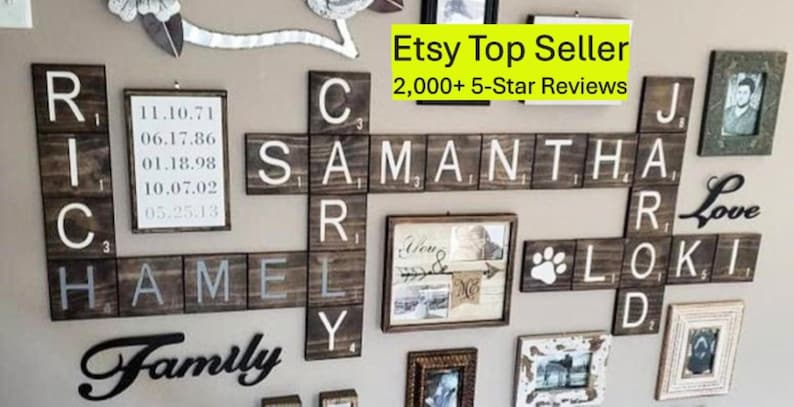 May include: A wall display featuring dark brown wooden tiles arranged like a crossword puzzle with white letters and numbers. The tiles spell out names including Rich, Hamel, Cary, Samantha, Jarod, and Loki. Includes framed photos and text.