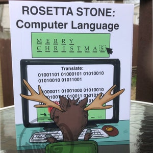 May include: A Christmas card with a cartoon reindeer sitting at a computer. The reindeer is trying to translate the phrase "Merry Christmas" into binary code. The card says "Rosetta Stone: Computer Language".