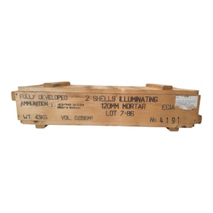 May include: A wooden ammunition crate with the text "FULLY DEVELOPED AMMUNITION" and "2 SHELLS ILLUMINATING 120MM MORTAR". The crate weighs 43 kg and has a volume of 0.056m3. The crate is labeled with "LOT 7-86" and "No 4191".