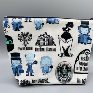 Haunted Mansion zipper pouch.  Handmade.  Various sizes to help keep all those small items together in your purse, backpack or suitcase.