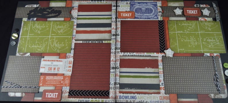 May include: A scrapbook layout with a red, white, and blue color scheme. The layout features a variety of sports-themed paper, including football, basketball, and baseball. The layout also includes a ticket stub, a star, and the word "TICKET" printed on the page.