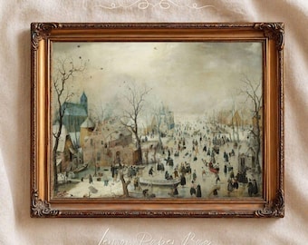 May include: A framed landscape painting depicting a winter scene with a frozen canal, numerous figures skating and walking, bare trees, and buildings under a pale sky. The artwork is enclosed in an ornate, metallic gold-toned rectangular frame.