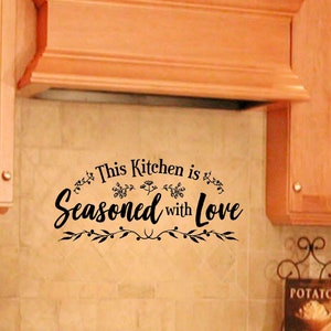 This kitchen is seasoned with love vinyl wall decal.   Great looking wall decal for any kitchen.  Seasoned with love, sign decal.