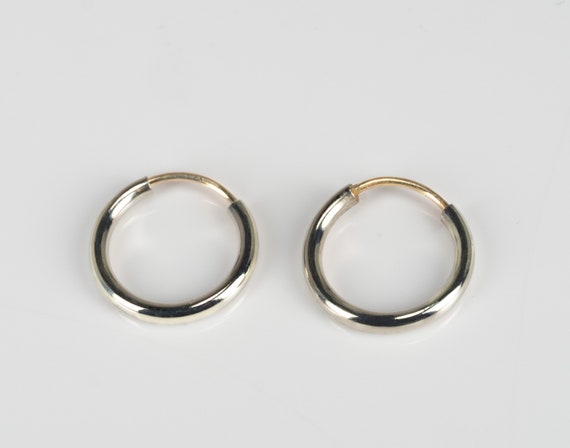 Plain white gold hoop earrings store