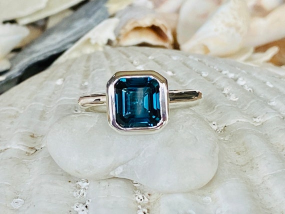Buy AAA Natural Genuine Swiss Blue Topaz Ring, Emerald Cut Blue Gemstone  Gold Ring, Natural Certified Swiss Blue Topaz Ring Online in India - Etsy