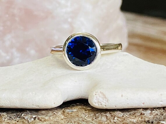 Bezel set hotsell sapphire engagement ring
