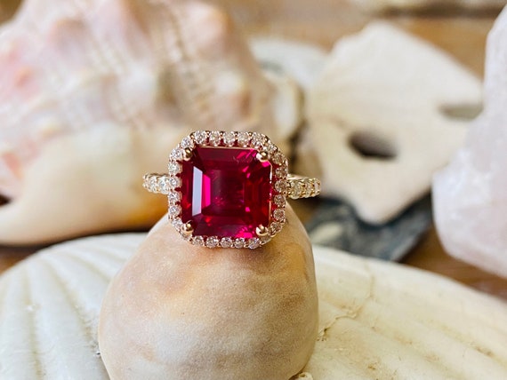 Ruby with 2024 diamond halo ring